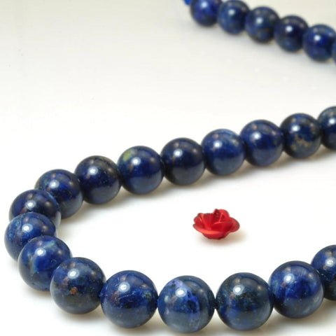 47 pcs of Blue stone smooth round beads in 8mm