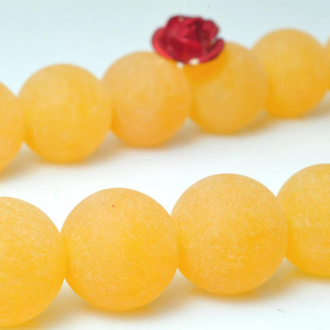 37 pcs of Orange Jade matte round beads in 10mm