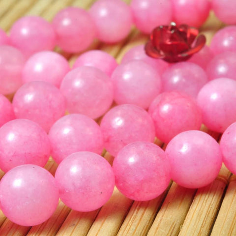 62 pcs of Dyed Pink Jade smooth round beads in 6mm