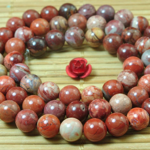 62 pcs of Natural Red Porcelain smooth round beads in 6mm