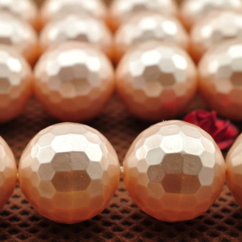 39 pcs of Shell Pearl faceted round beads in 10mm