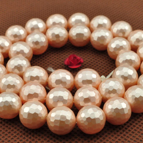 39 pcs of Shell Pearl faceted round beads in 10mm