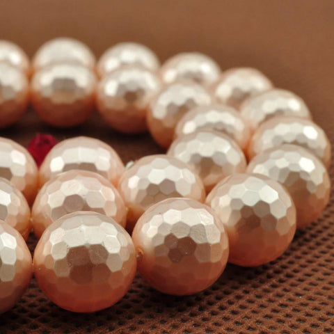 39 pcs of Shell Pearl faceted round beads in 10mm