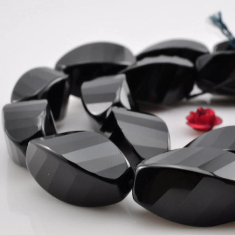 20 pcs of Black Onyx faceted twist beads in 10x20mm