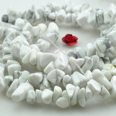 35 inches of White howlite smooth hips beads in 5-10mm
