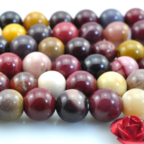 63 pcs of Mookaite smooth round beads in 6mm