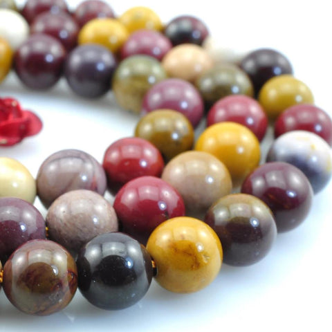 63 pcs of Mookaite smooth round beads in 6mm