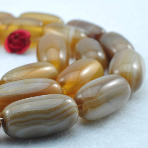 26 pcs of Banded Agate smooth drum beads in 7 x14mm