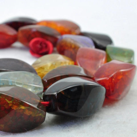 24 pcs of Fire Agate smooth twist beads in 8 x 16mm
