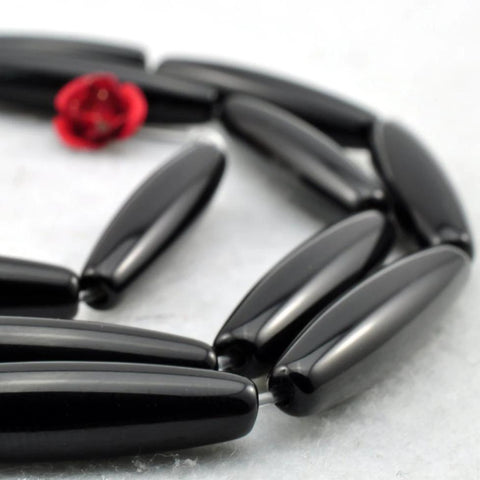 YesBeads 15 inches of Black Onyx smooth rice beads in 13x18mm