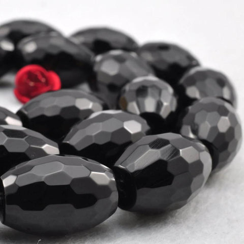 28 pcs of Black Onyx smooth rice beads in 10x14mm