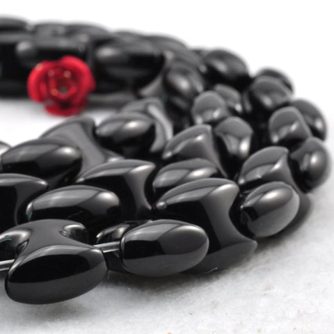 15 inches of Black Onyx smooth axe chain beads in 8X8mm