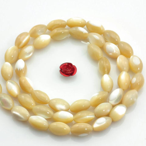44 pcs MOP of Pearl Shell smooth rice beads in 5.5-6X9mm