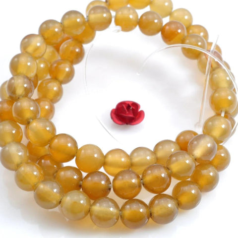 63 pcs of Agate smooth round beads in 6mm
