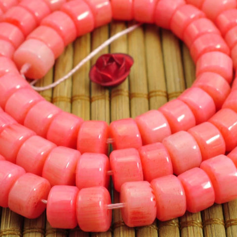96 pcs of Red Coral smooth wheel beads in 4x6mm