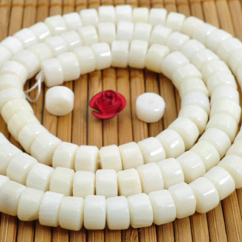 96 pcs of Coral smooth wheel beads in 4x6mm
