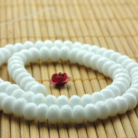 91 pcs of White Ware faceted rondelle beads in 4x6mm
