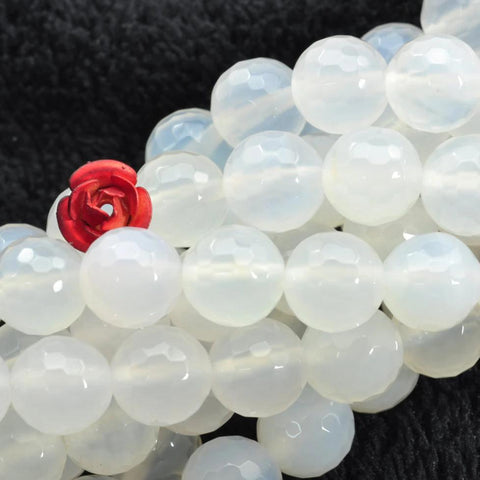 47 pcs of White agate faceted round beads in 8mm