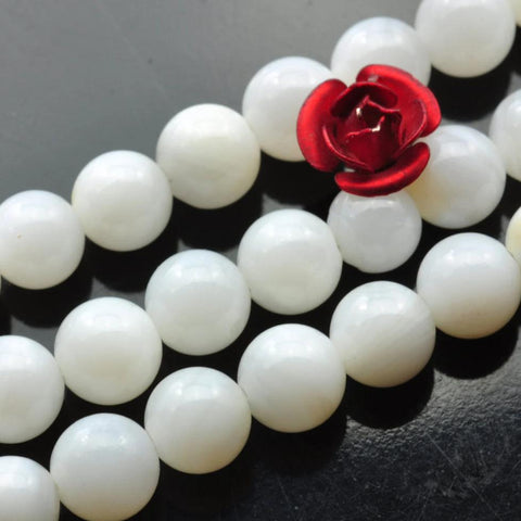 64 pcs of white color Shell smooth round beads in 6mm