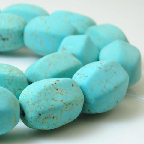 23 pcs of Chinese Turquoise matte drum beads in 11x15mm