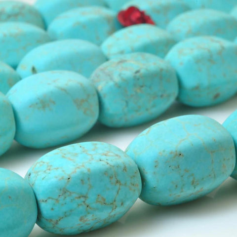 23 pcs of Chinese Turquoise matte drum beads in 11x15mm