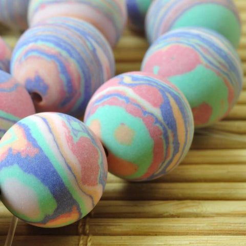 32 pcs of Pink Malachite matte Synthetic round beads in 12mm