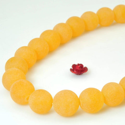 37 pcs of Orange Jade matte round beads in 10mm