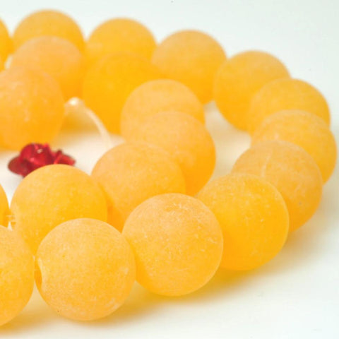 37 pcs of Orange Jade matte round beads in 10mm