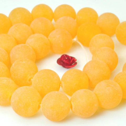 37 pcs of Orange Jade matte round beads in 10mm