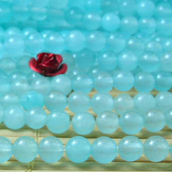 92 pcs of Natural Dyed Blue Jade smooth round beads in 4mm