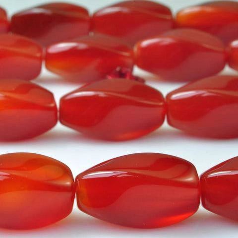 23 pcs of Natural  Carnelian  smooth twist beads in 8 x16mm