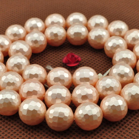 39 pcs of  Shell Pearl faceted round beads in 10mm
