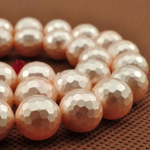 39 pcs of  Shell Pearl faceted round beads in 10mm