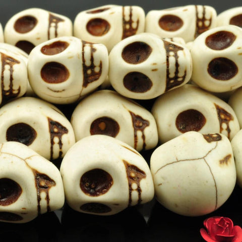 23 pcs of synthetic Turquoise skull shape beads in 13x18mm,White