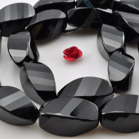 20 pcs of Black Onyx faceted  twist beads in 10x20mm