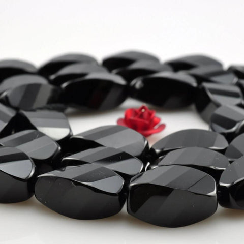 33 pcs of Black Onyx faceted  twist beads in 6x12mm