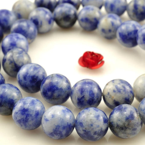 47 pcs of  Blue stones smooth round beads in 8mm