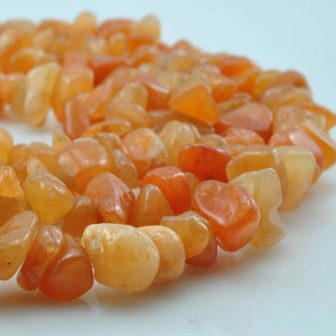 35 inches of  Natural Red Aventurine smooth  chips beads in 5-10mm