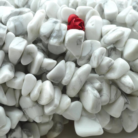 35 inches of White howlite smooth hips beads in 5-10mm