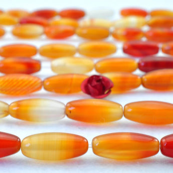 31 pcs of  Rainbow Agate smooth drum beads in 5x12mm