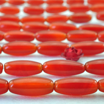 31 pcs of  Carnelian  smooth drum beads in 5 x12mm