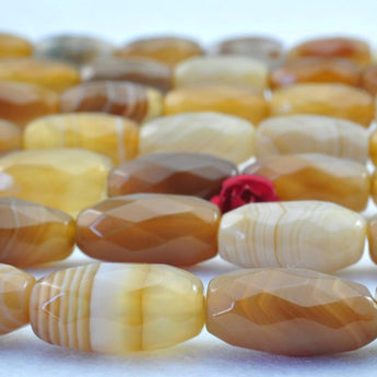26 pcs of  Banded Agate faceted drum beads in 7 x14mm