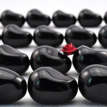22 pcs of Black Onyx smooth teardrop beads in 13x18mm