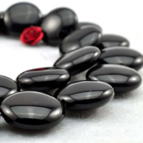 28 pcs of Black Onyx smooth coin beads in 14mm