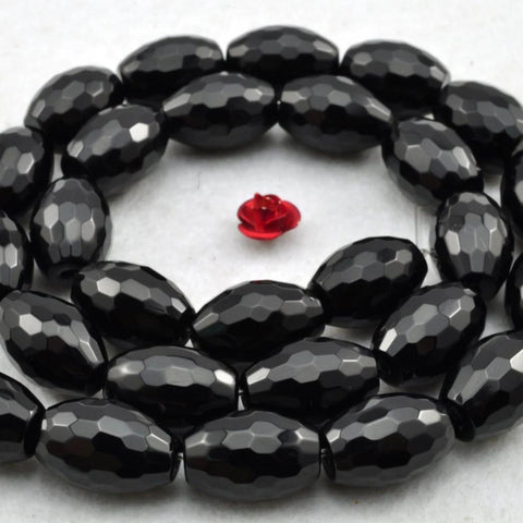 28 pcs of Black Onyx smooth rice beads in 10x14mm