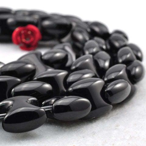 15 inches of Black Onyx smooth axe chain  beads in 8X8mm