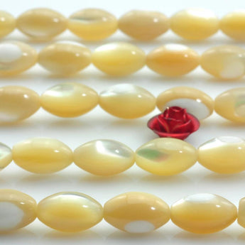 44 pcs MOP of Pearl Shell smooth rice beads in 5.5-6X9mm