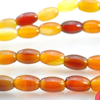 31 pcs of  Rainbow Agate smooth drum beads in 4 x 6mm