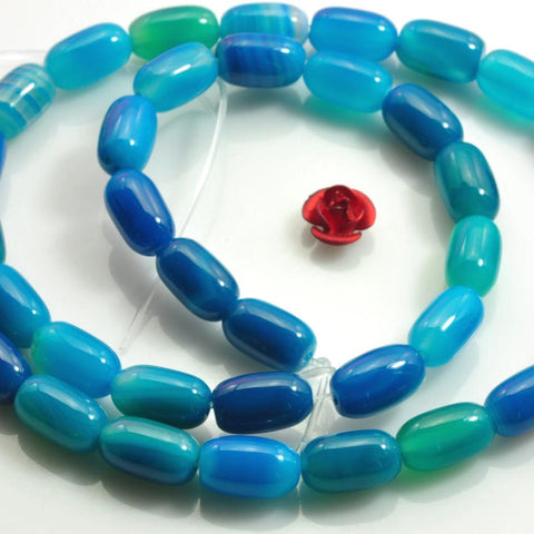 37 pcs of Blue Agate smooth drum beads in 6x10mm