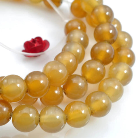 63 pcs of Agate smooth round beads in 6mm